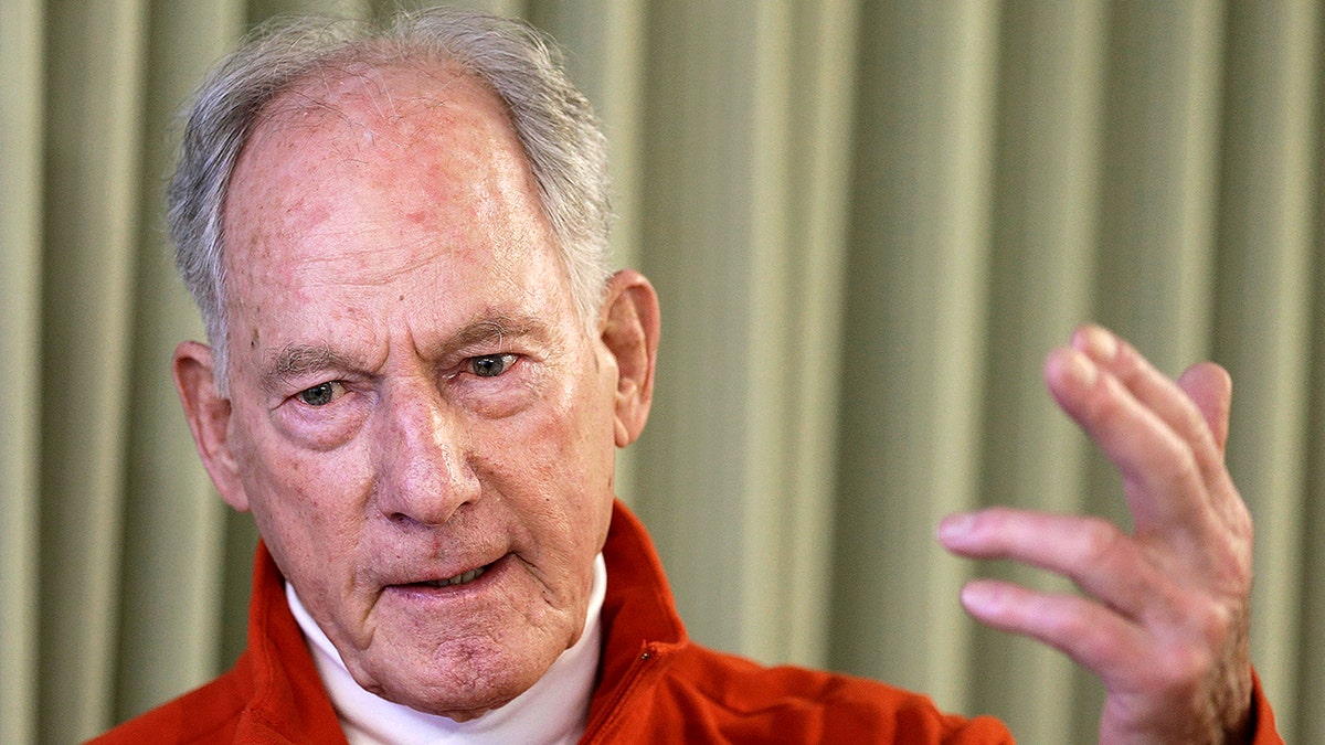 Jim Whittaker gestures with his hand while speaking.