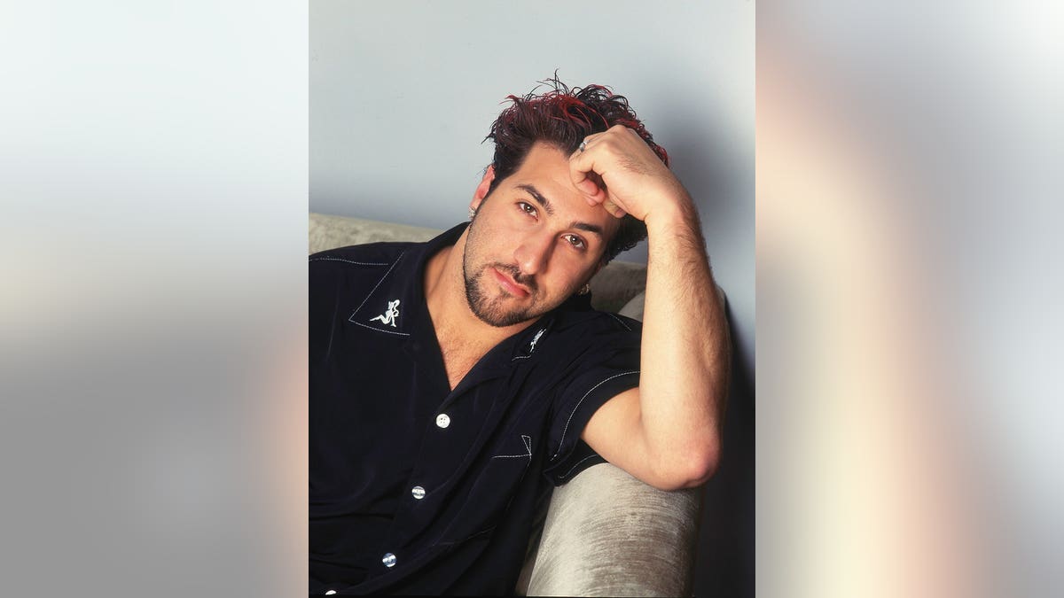 Singer Joey Fatone standing in the penthouse suite of the Chateau Marmont in Los Angeles