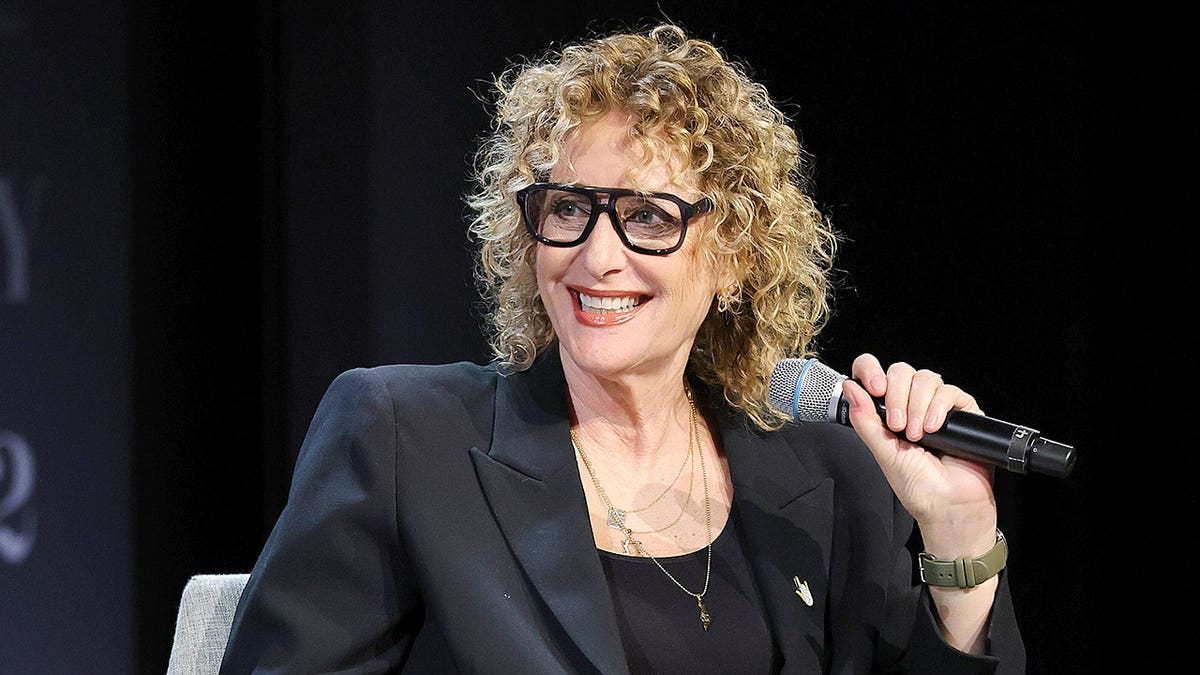 Judy Gold speaking onstage at 92NY in New York City