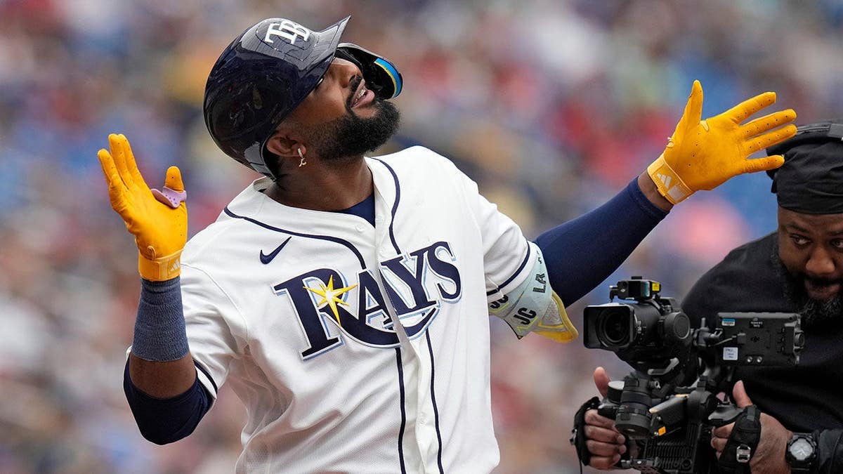 Tampa Bay Rays' Junior Caminero celebrating after hitting a home run during a baseball game