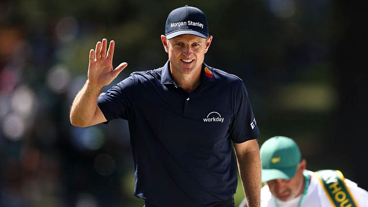 Justin Rose acenando para os mestres