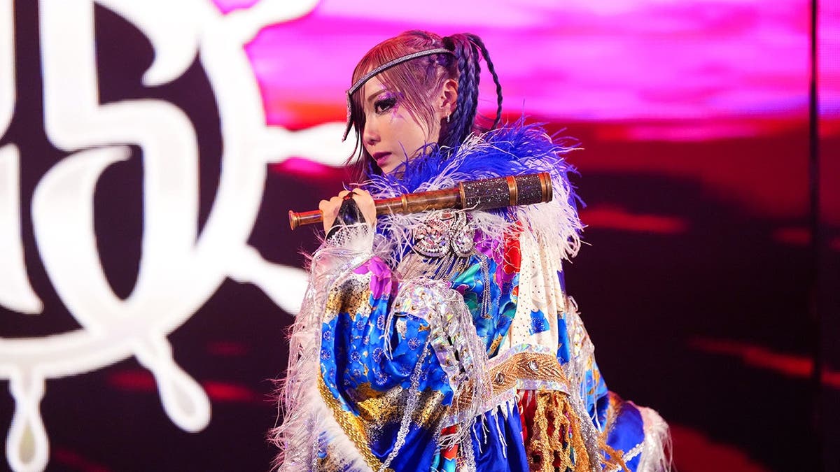 Kairi Sane entering the wrestling ring at Golden 1 Center in Sacramento