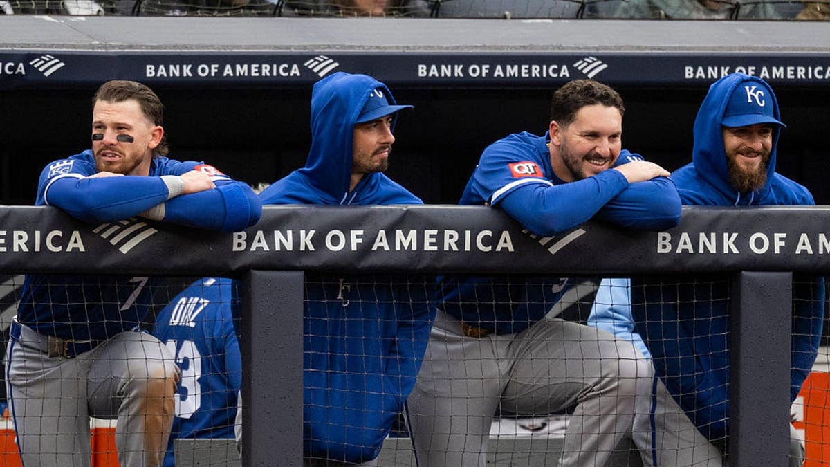 Members of the Kansas City Royals watch from the dugout at Yankee Stadium