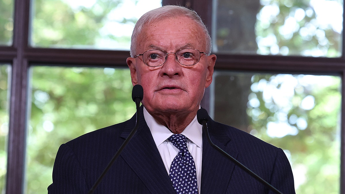 Keith Kellogg speaking at a podium during the National Prayer Breakfast.