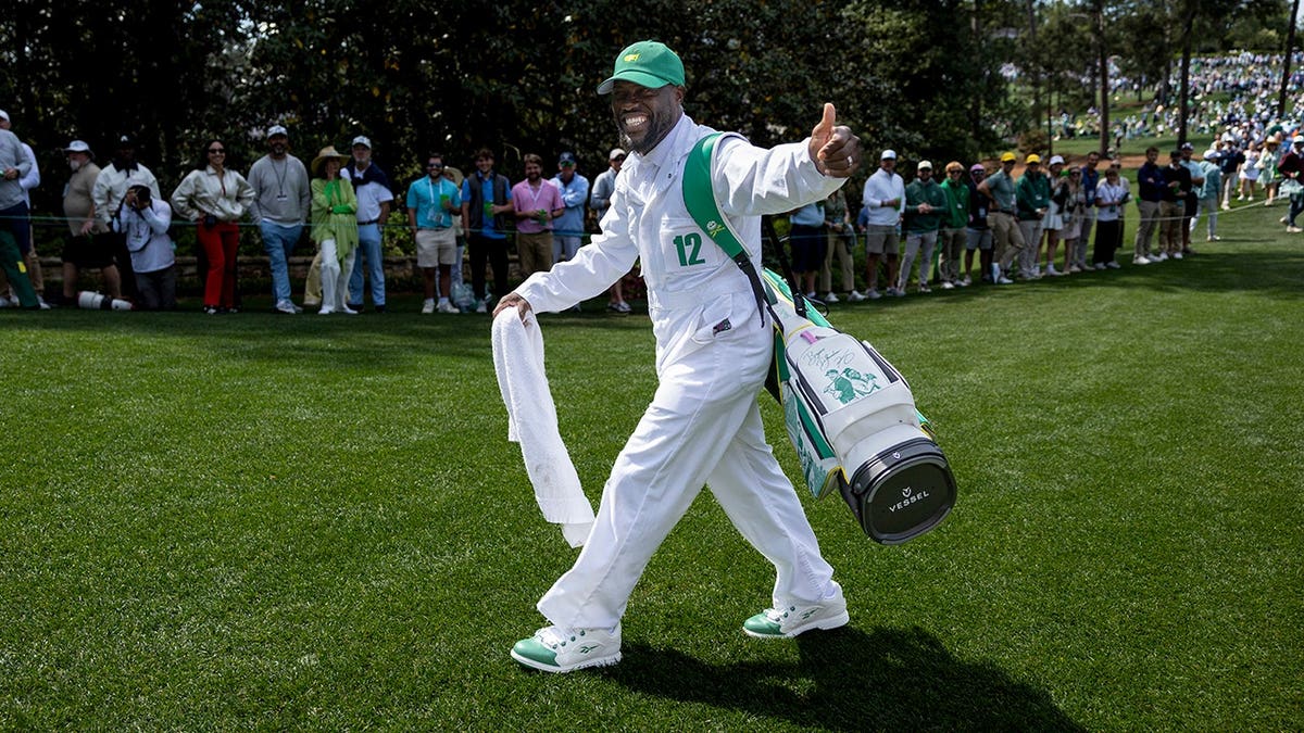 Comedian Kevin Hart walking astatine  Augusta National Golf Club