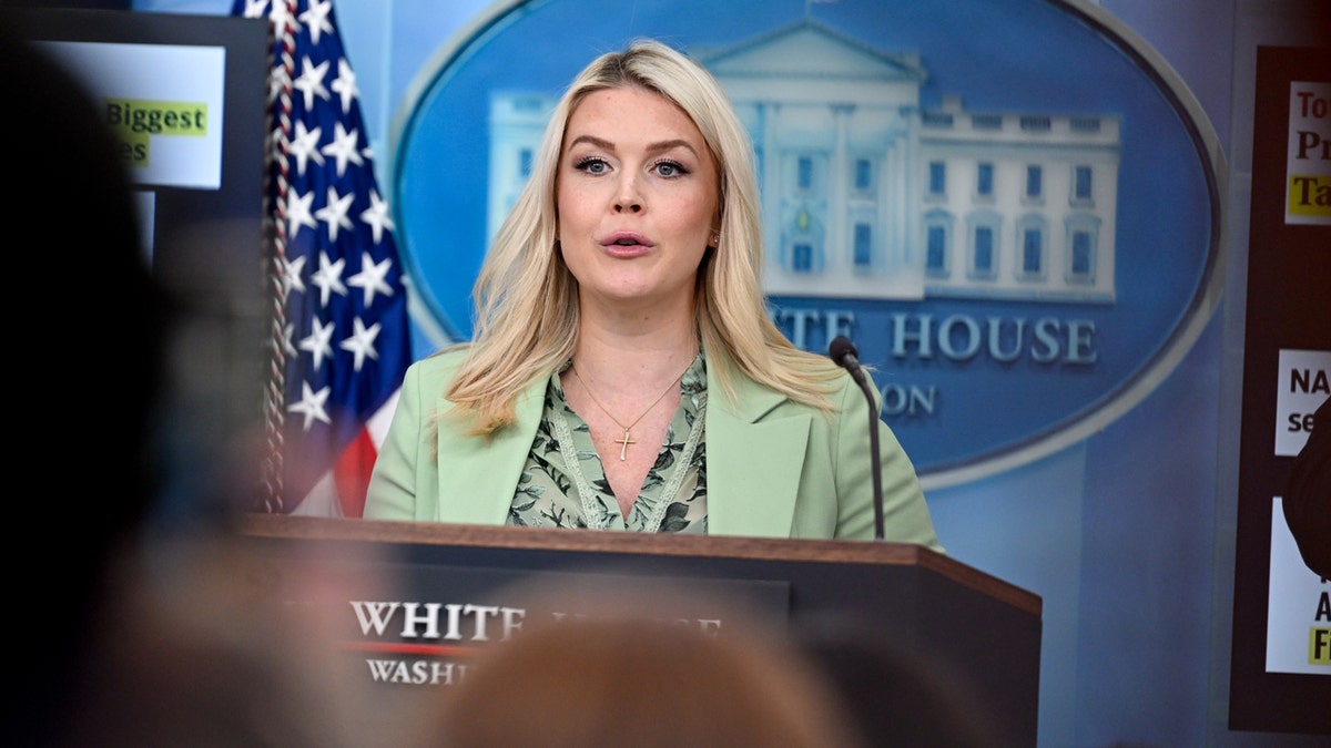 Karoline Leavitt speaking during a news conference in the White House briefing room