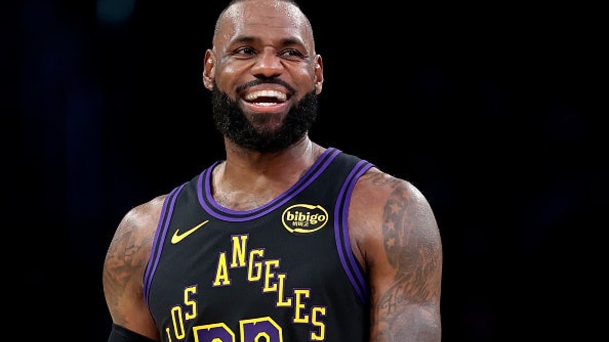LeBron James wearing number 23 jersey reacts during basketball game at Crypto.com Arena