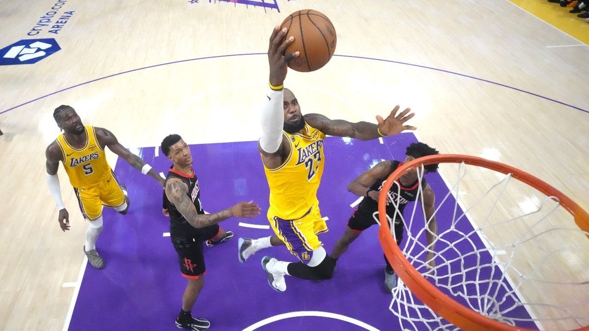 Los Angeles Lakers' LeBron James gets a layup vs. the Houston Rockets in Game 1 of their first-round Western Conference Playoffs series at Crypto.com Arena.