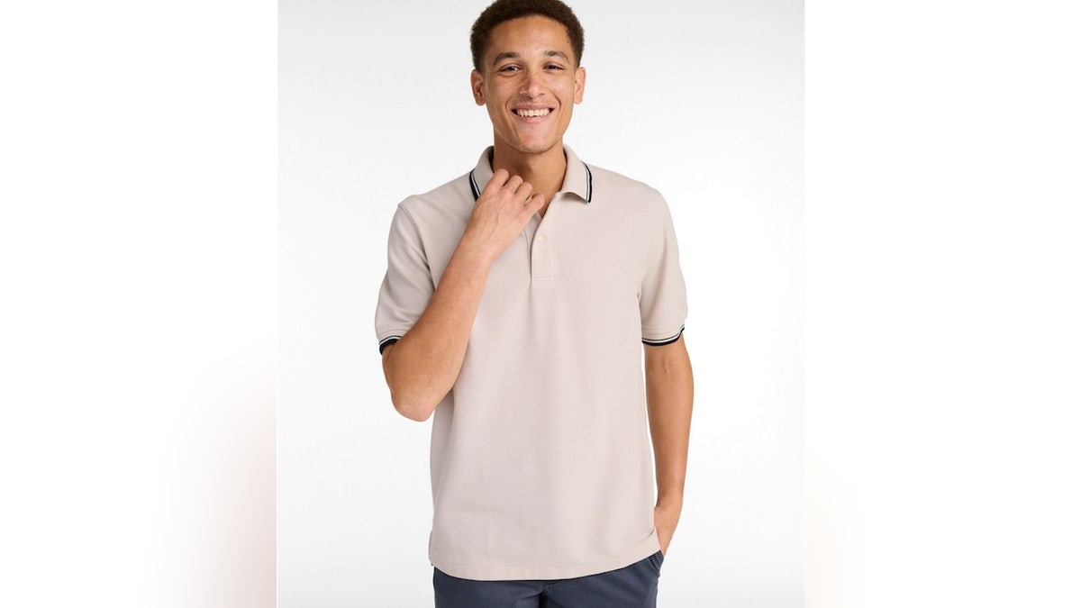 An all-cotton polo that features banded short sleeves. 