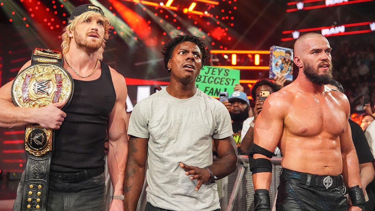 Logan Paul, IShowSpeed, and Austin Theory looking on during Monday Night RAW at Toyota Center in Houston