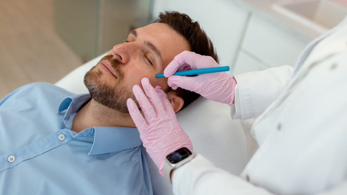 Man prepping for cosmetic surgery