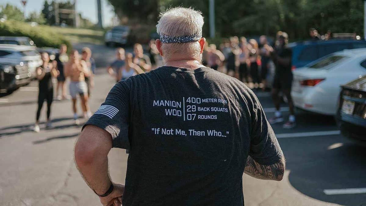 man completes Manion WOD workout