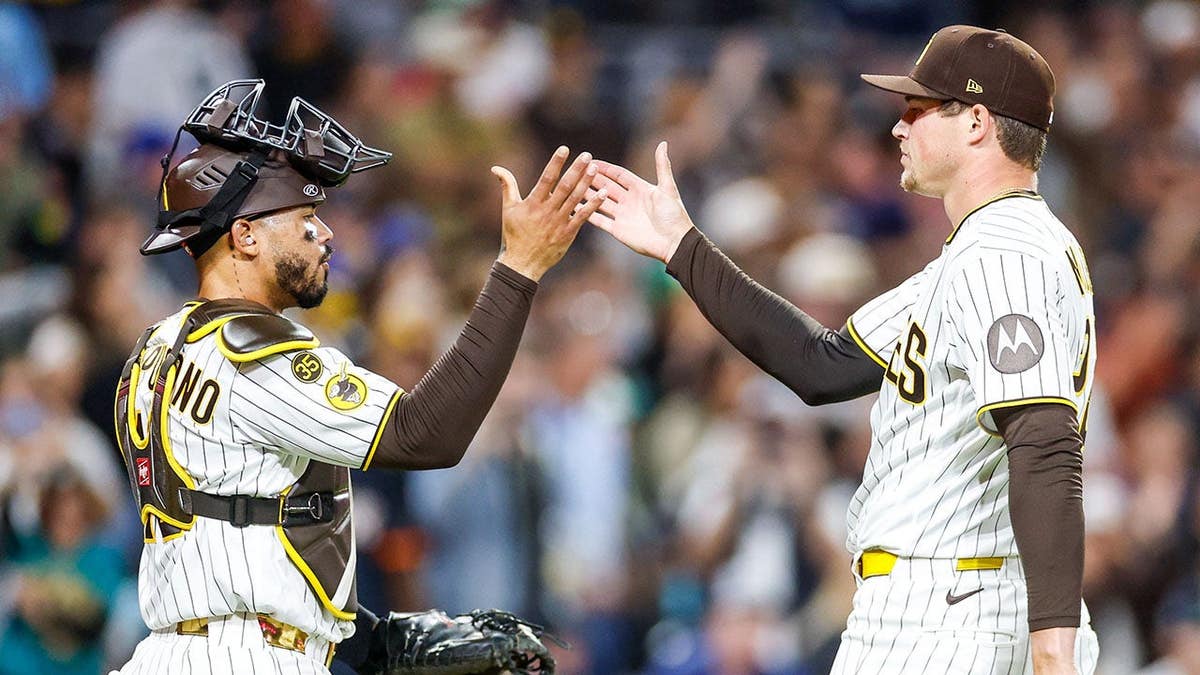 Mason Miller celebrating with Luis Campusano at Petco Park