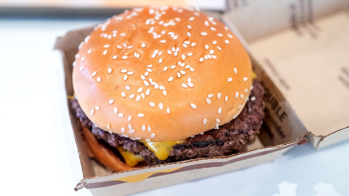 Close-up of McDonald's double quarter pounder with cheese in box
