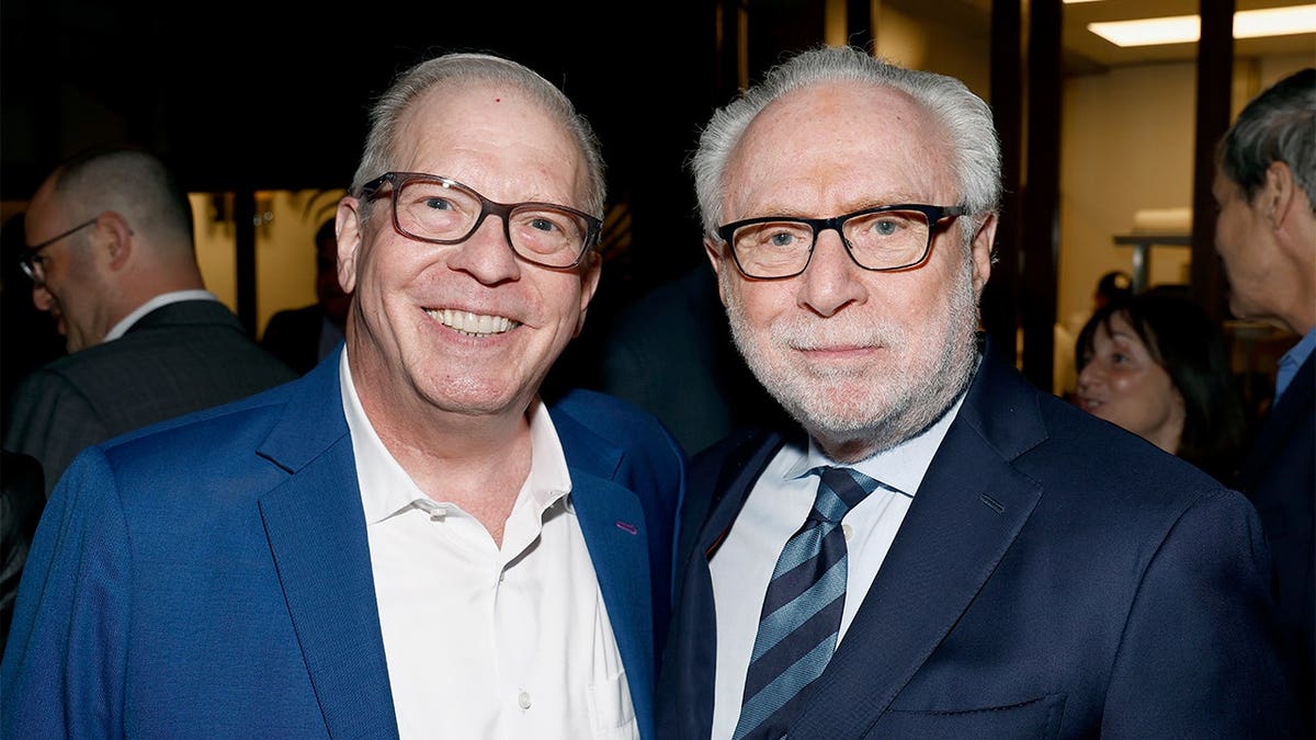 Michael Glantz and Wolf Blitzer standing together at an event in Washington, D.C.