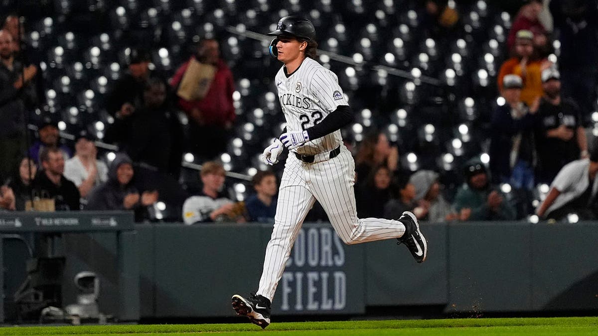 Colorado Rockies close    fielder Mickey Moniak moving  aft  hitting a location  tally  astatine  Coors Field
