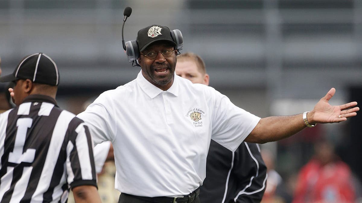 Arkansas-Pine Bluff head coach Monte Coleman arguing a call on the sidelines