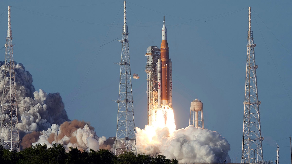 NASA's Artemis II moon rocket lifting off from Kennedy Space Center launch pad