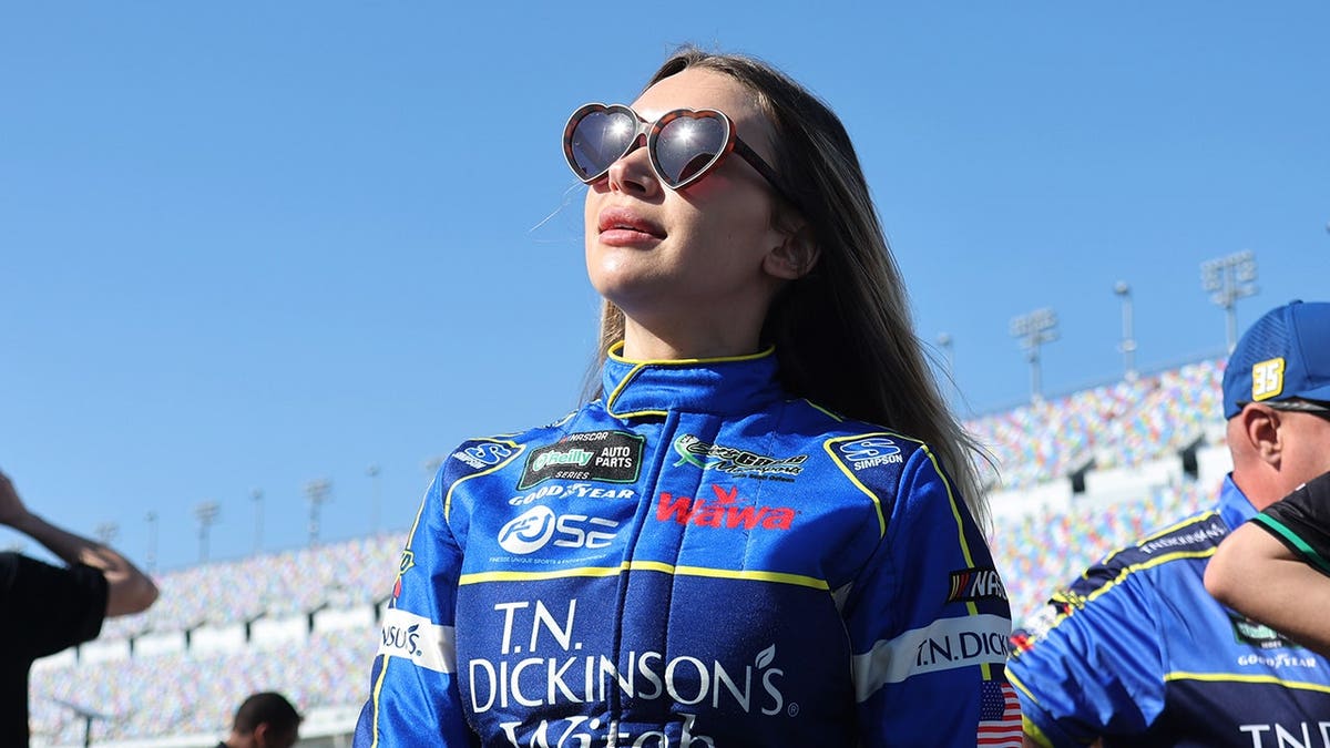 Natalie Decker talking with her crew during NASCAR qualifying at Daytona International Speedway