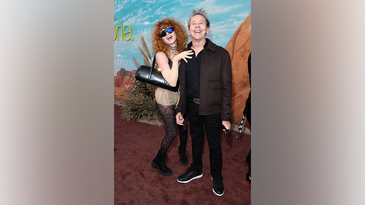 Natasha Lyonne grabs Brian Grazer at the Euphoria season 3 premiere.