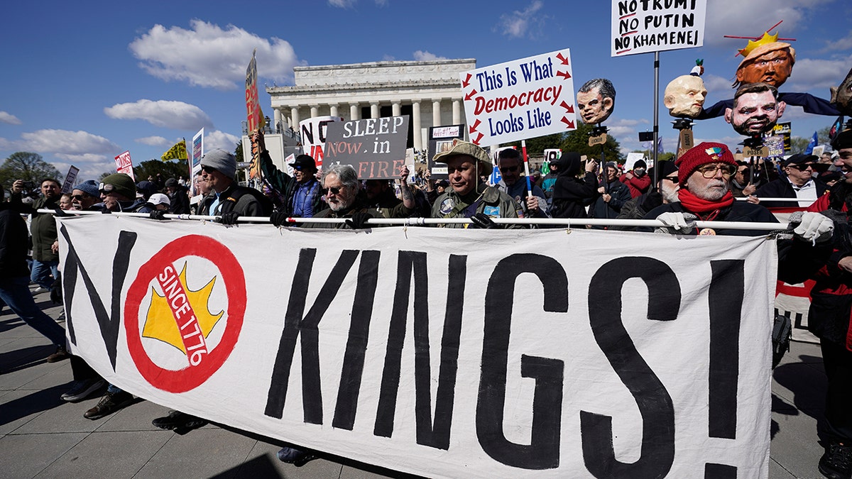 Demonstrators rally in front of the Lincoln Memorial in Washington