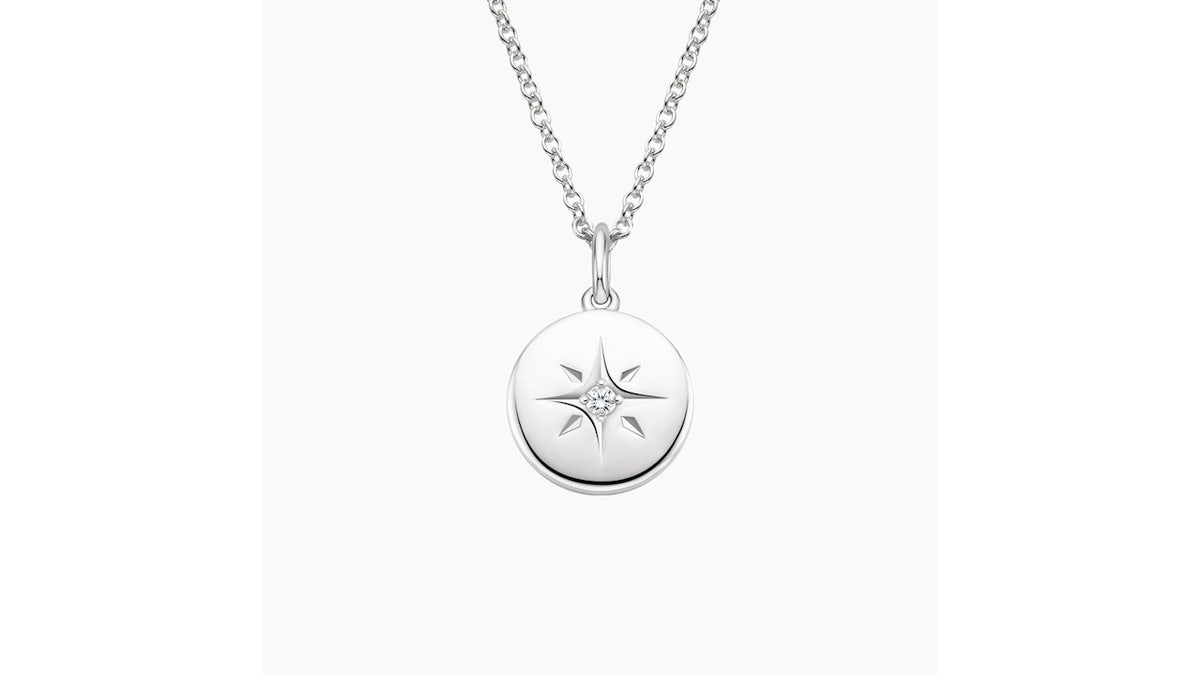 Romantics and space enthusiasts can appreciate this star-studded pendant.