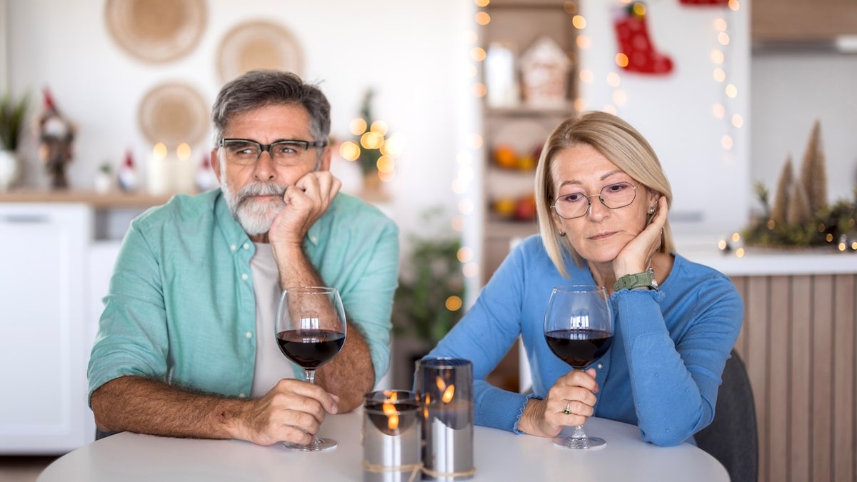 Older couple drinking wine