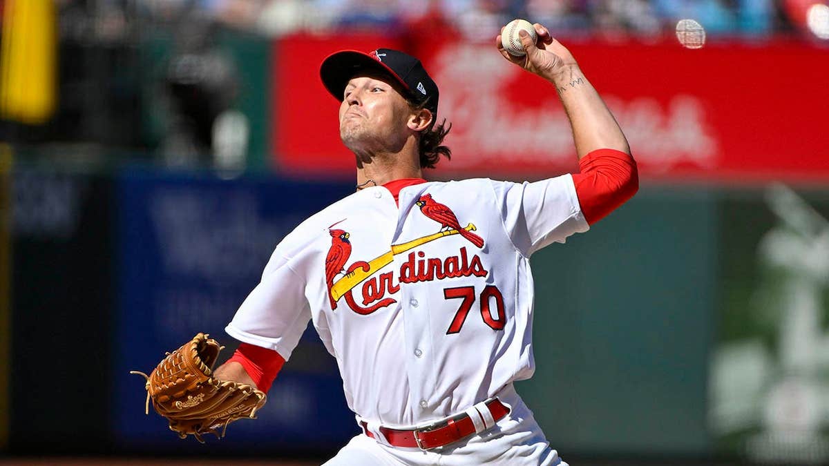 Packy Naughton pitching during a shot   crippled  astatine  Busch Stadium.