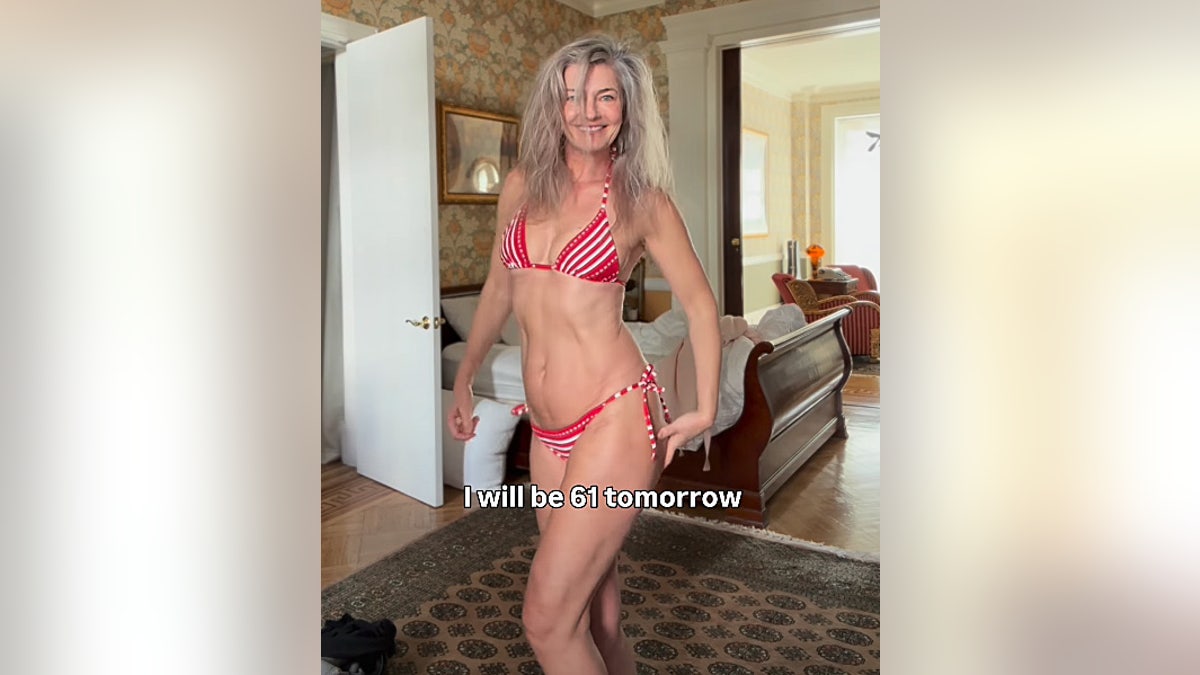 Paulina Porizkova models in a red and white bikini