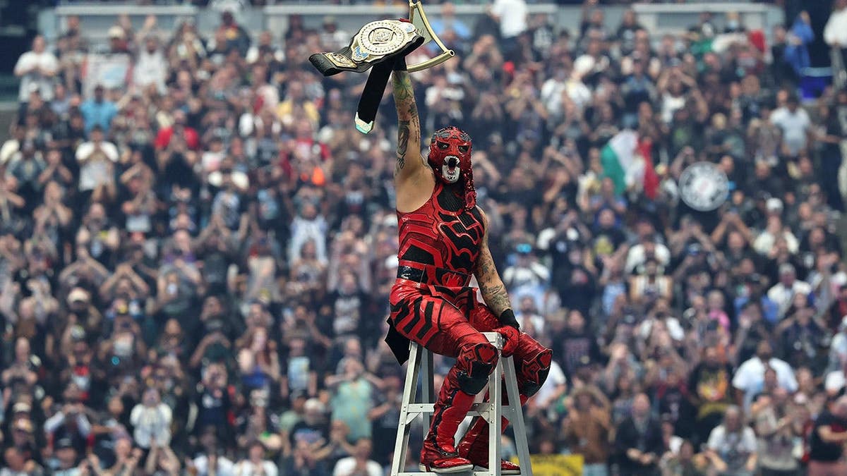 Penta celebrating victory in the Intercontinental Championship Ladder match at Allegiant Stadium