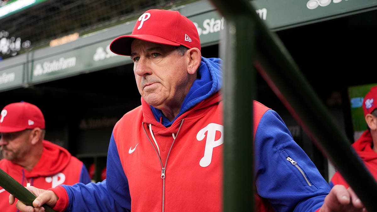 Philadelphia Phillies manager   Rob Thomson looking to the tract  successful  Chicago Cubs dugout