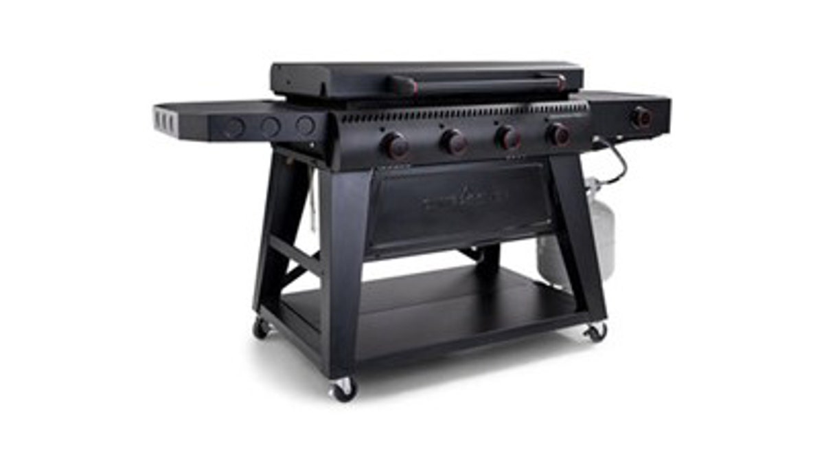 This huge flat top has folding shelves and a side burner. 