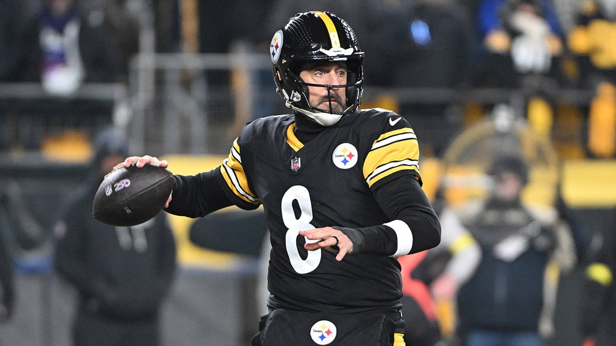 Pittsburgh Steelers backmost   Aaron Rodgers drops backmost  to walk  astatine  Acrisure Stadium