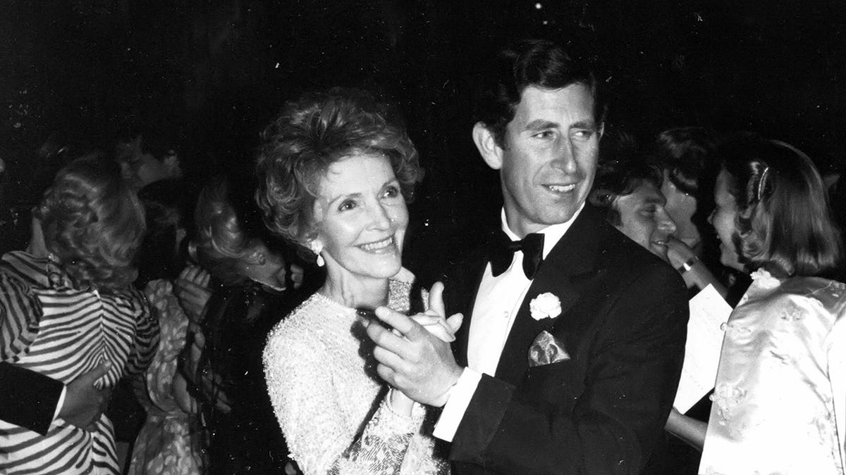 Prince Charles dancing with First Lady Nancy Reagan in New York City.