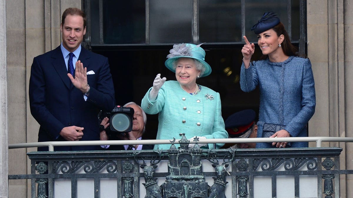 Prince William with Kate Middleton and Queen Elizabeth at the Council House during her Diamond Jubilee in June 2012.
