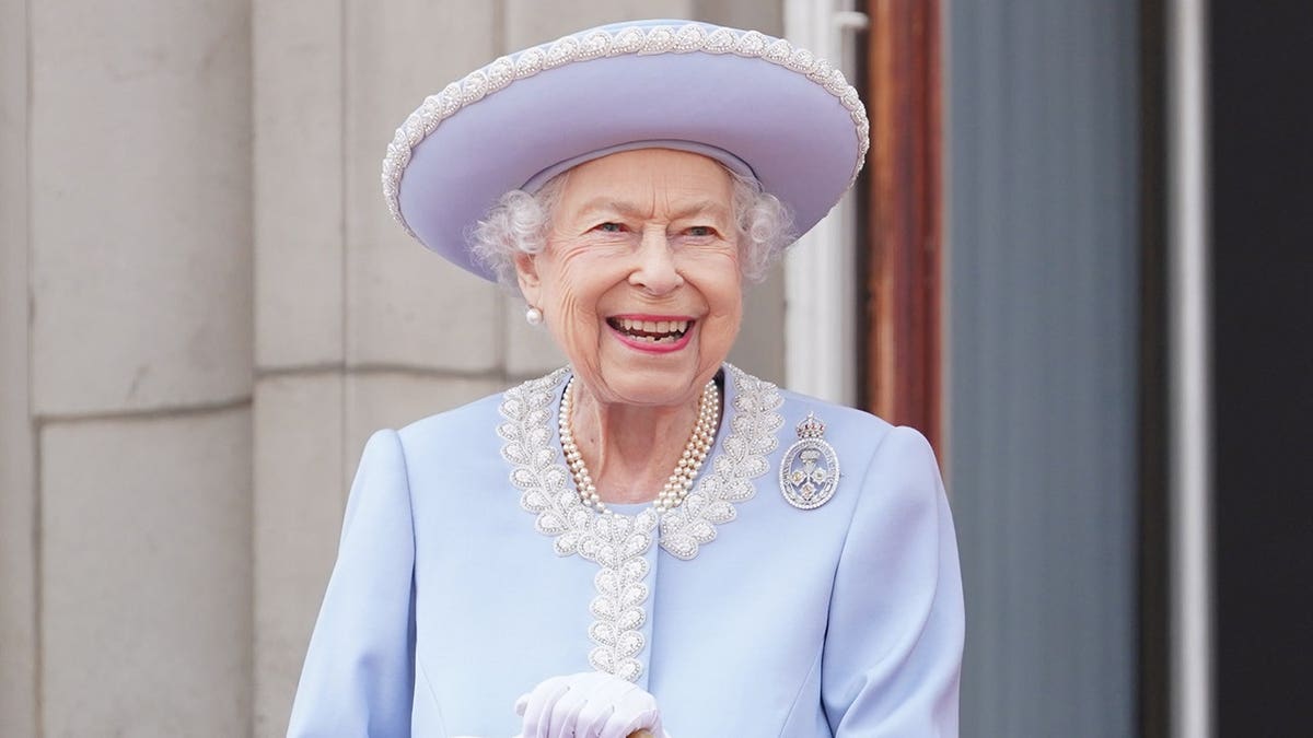 Queen Elizabeth II watching from Buckingham Palace balcony during Trooping the Colour parade