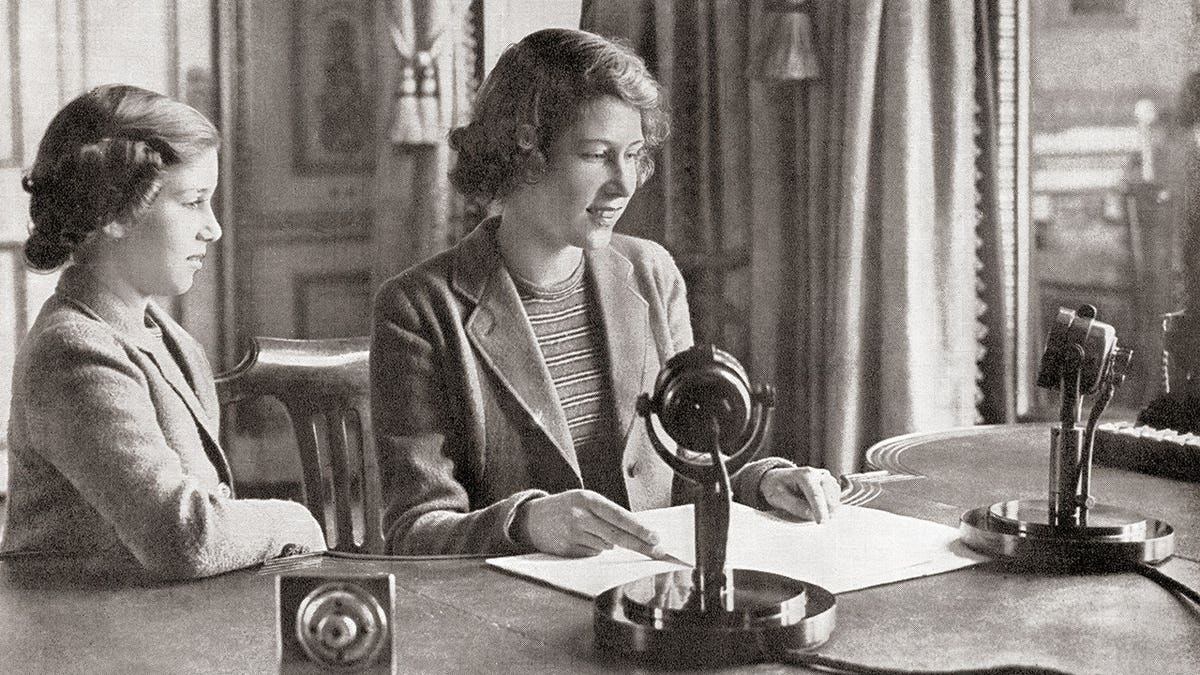 Princess Margaret and Queen Elizabeth giving a public broadcast in October 1940 in England.