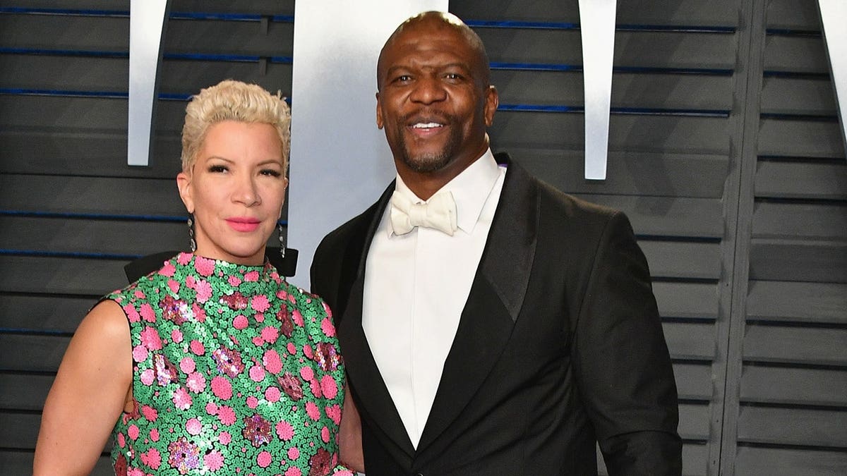Rebecca King-Crews and Terry Crews standing together at an event