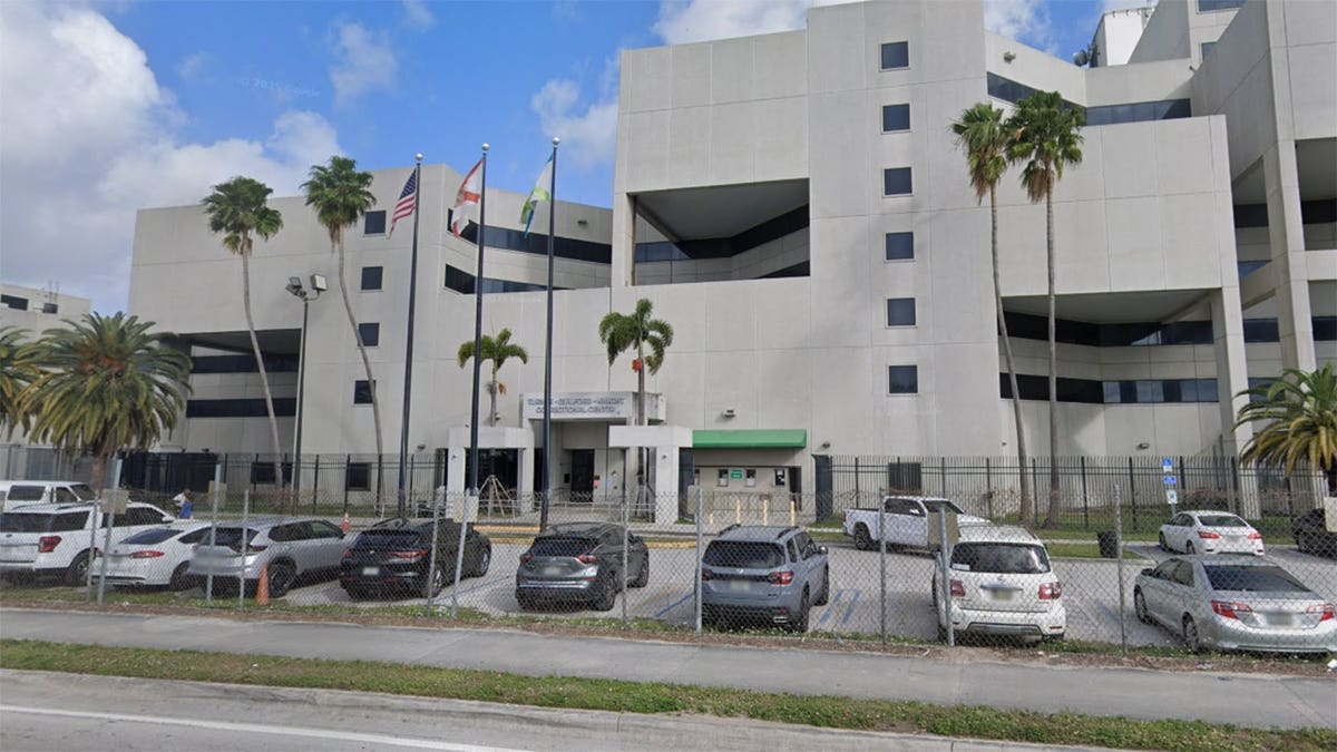 Rodriguez standing outside Miami-Dade Turner Guilford Knight Correctional Center