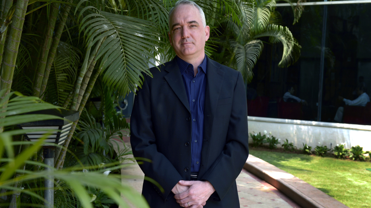 Former Obama and Biden administration advance man Roger Fisk poses for a photo.