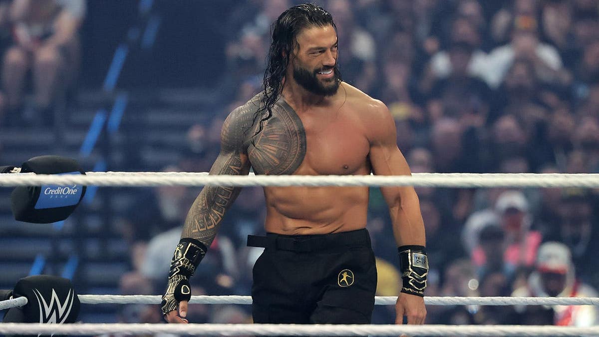 Roman Reigns standing in wrestling ring at Allegiant Stadium