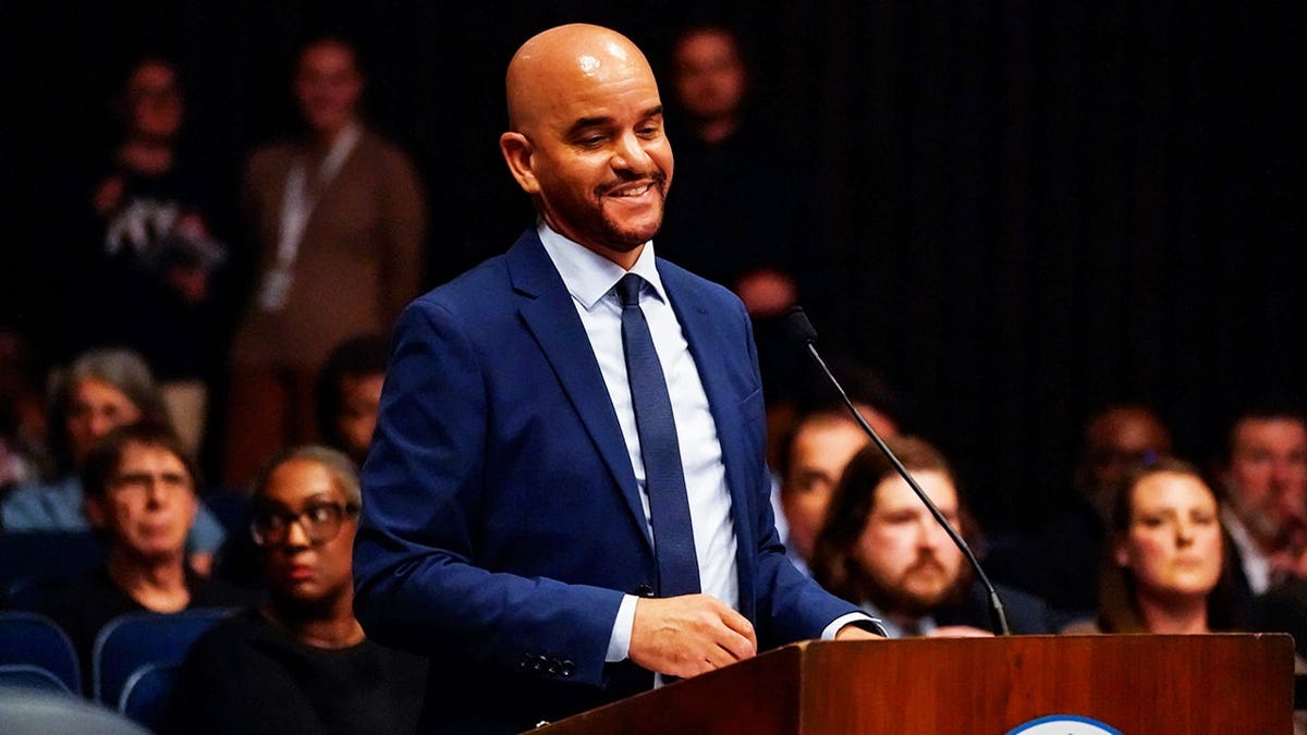 Indianapolis councilor Ron Gibson speaking at podium during data center meeting