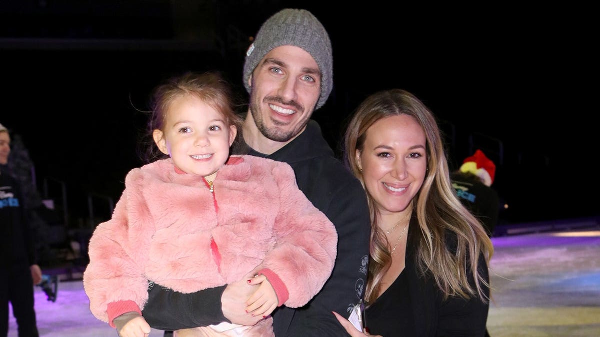 Ryan Rosenberg, Matt Rosenberg and Haylie Duff standing together at an event.