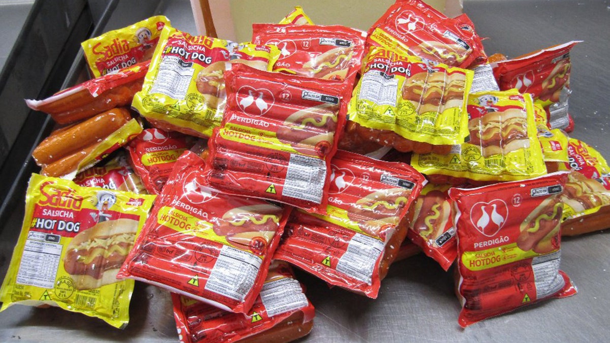 Dozens of packages of Brazilian hot dogs on display