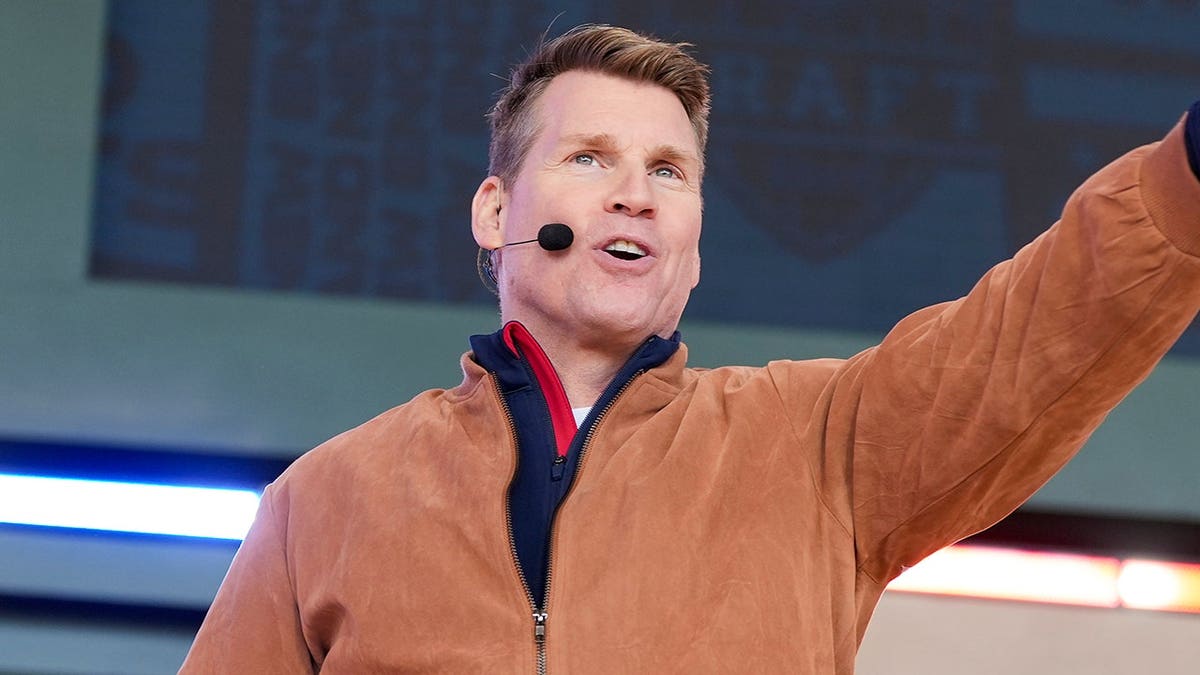 NFL Network's Scott Hanson speaking on stage at the NFL Draft in Green Bay, Wisconsin