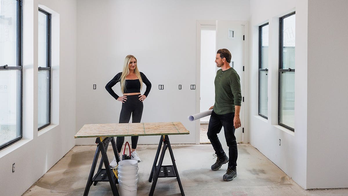 Scott McGillivray and Brooke Hogan discussing plans for a multi-generation suite