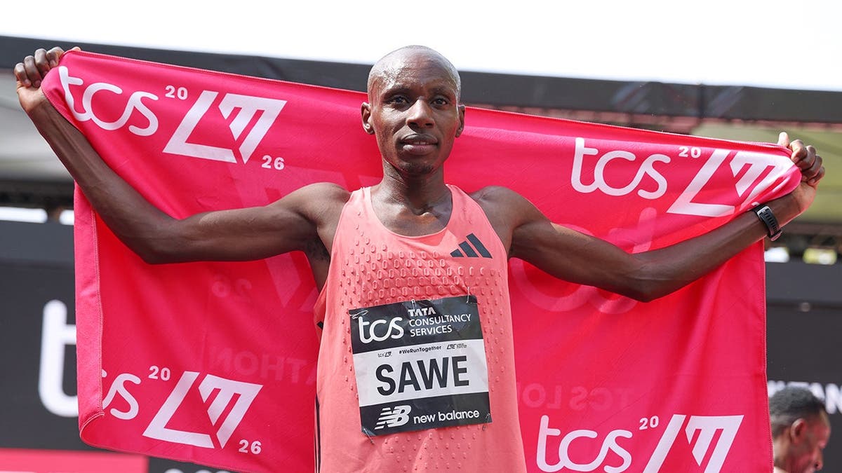 Sebastian Sawe celebrating after winning the men's race at the London Marathon