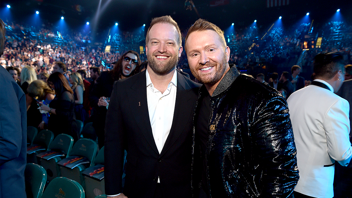 Country star Shane McAnally and partner Michael Baum attend the Academy of Country Music Awards.