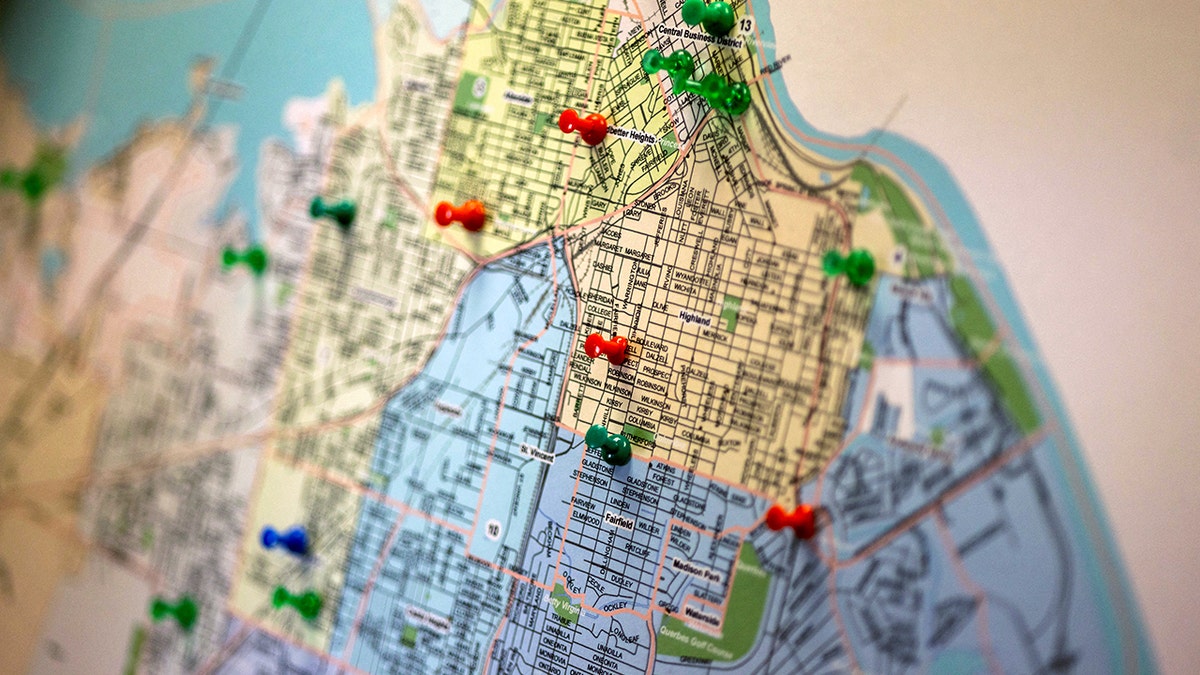 A map of Shreveport is shown with multicolored pins.