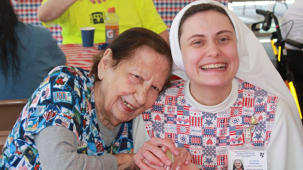 sister-hugs-resident